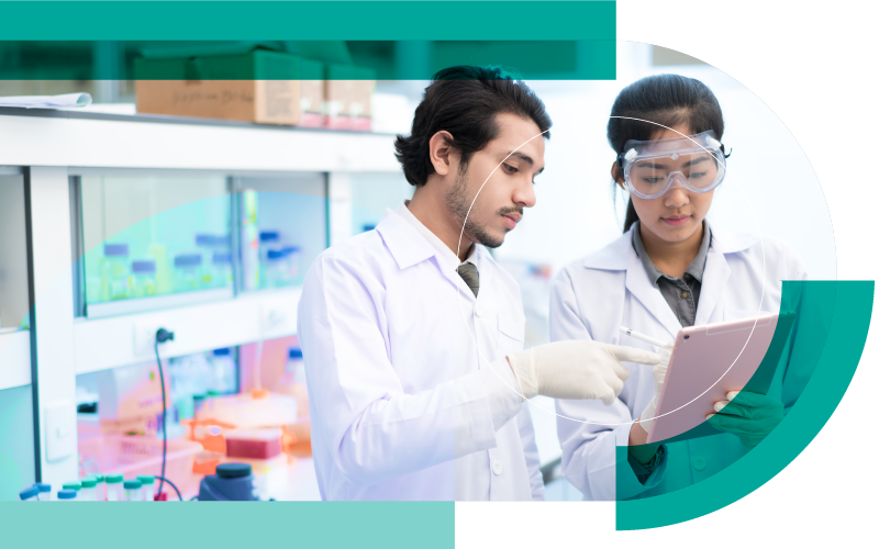 Researchers standing in lab